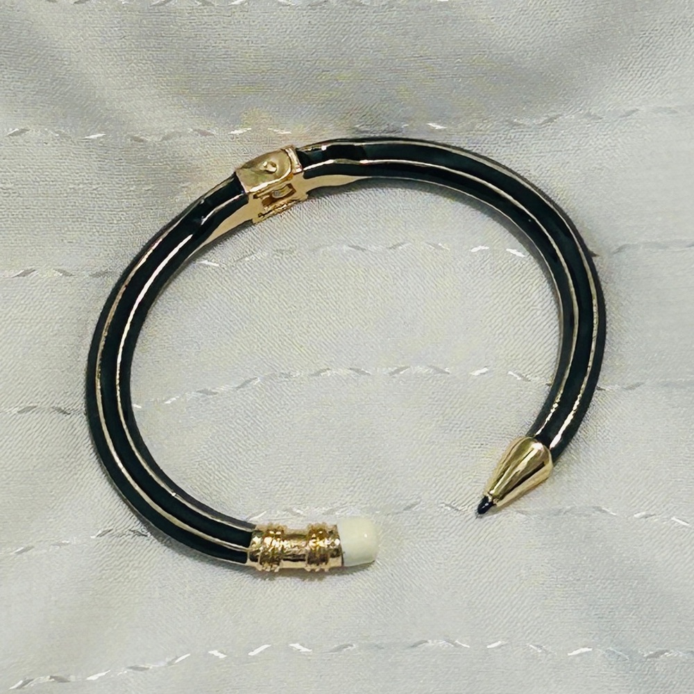 Plunder Pencil Shaped Elegant Black and Gold Open Cuff Bracelet. - Picture 4 of 6